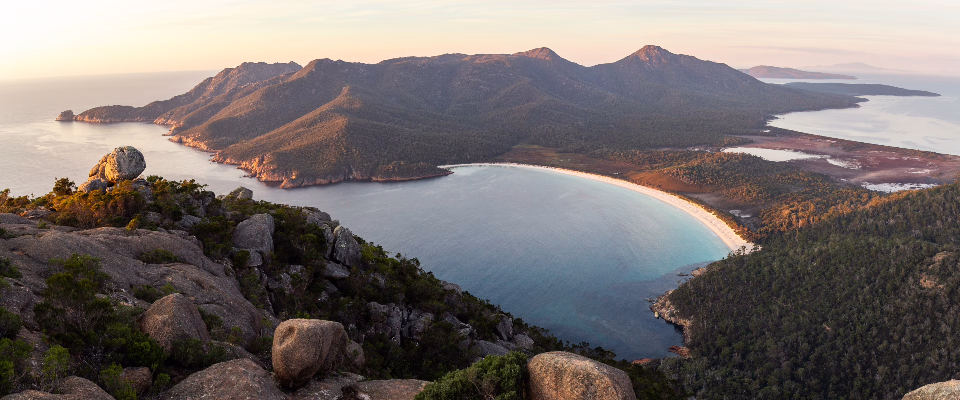 Image of wineglass bay, one of Tasmanias most popular attactions to visit with a car hire.
